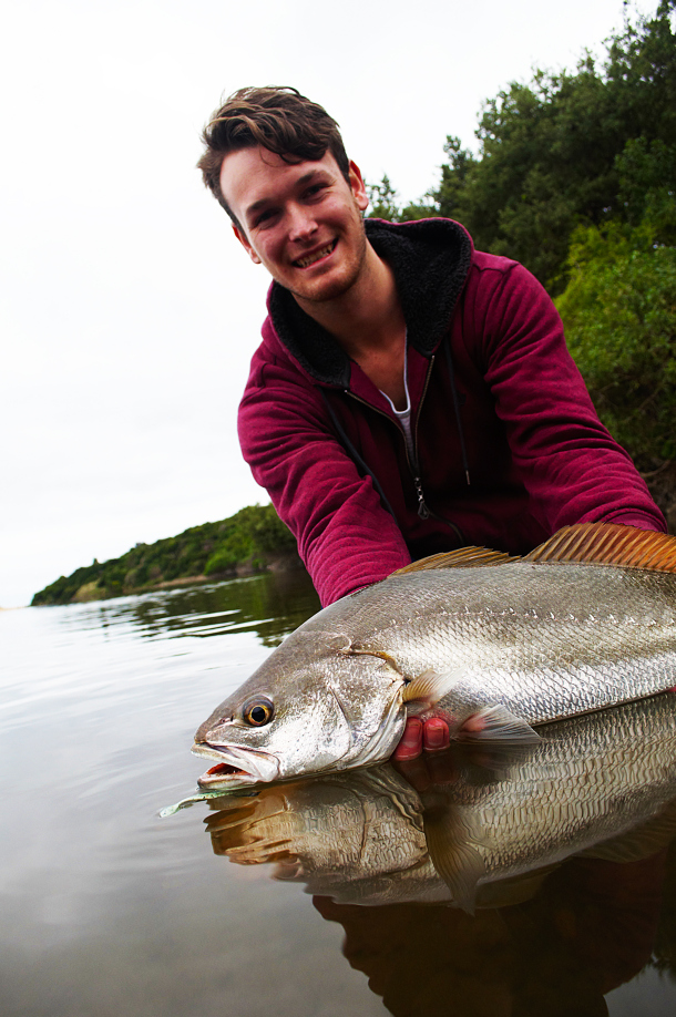 Chris Cleaver with his recently caught and released hybrid cod he likes to call a Murrout (cross between a Murray and trout cod).